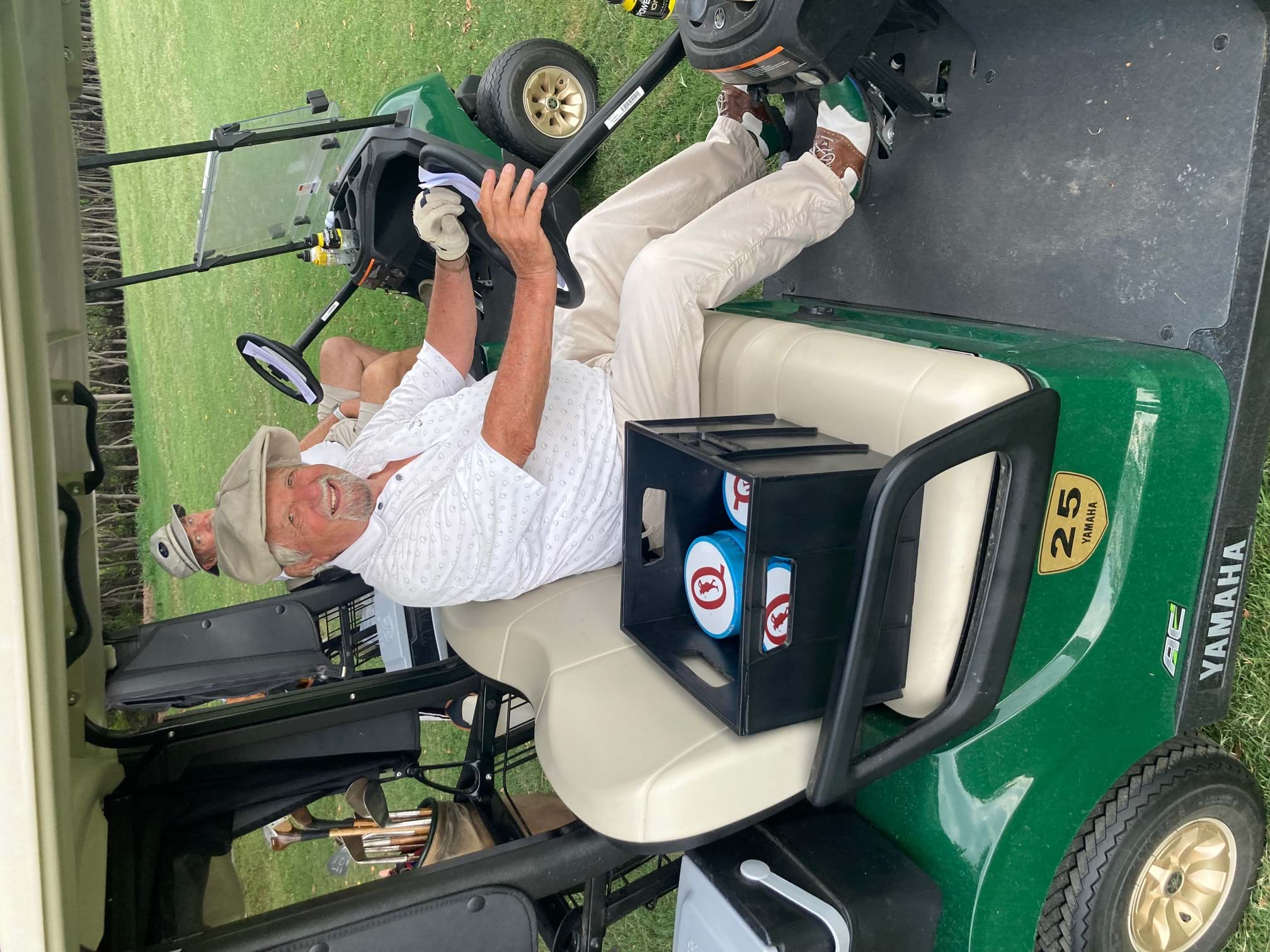 Always contributing.  Arthur collecting the tee markers.