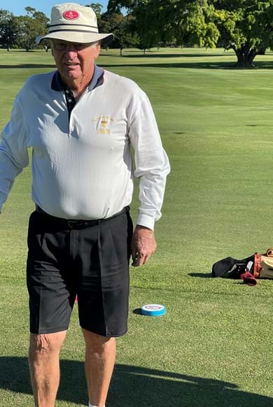 Winner Ross Bishop with new tee marker behind